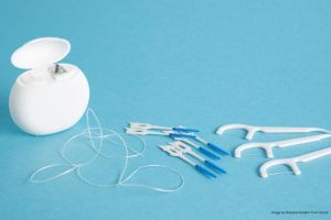 how to clean between your teeth
